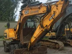 Экскаватор-погрузчик JCB JS 160W 2010 года б/у фото 2