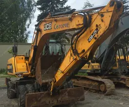 Экскаватор-погрузчик JCB JS 160W 2010 года б/у фото 2
