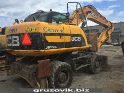 Экскаватор-погрузчик JCB JS 160W 2010 года б/у фото 3