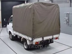 Тентованный грузовик Тентованный грузовик  Nissan 2011 года б/у фото 2