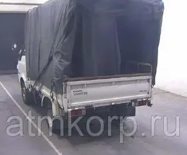 Тентованный грузовик Тентованный грузовик  Nissan 2013 года б/у фото 2