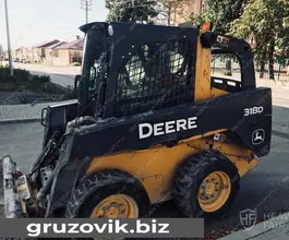 Фронтальный погрузчик John Deere 318d 2013 года б/у фото 2