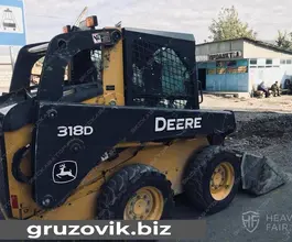 Фронтальный погрузчик John Deere 318d 2013 года б/у