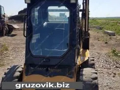 Фронтальный погрузчик Caterpillar 242В 2013 года новый фото 3