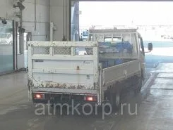 Самопогрузчик Mitsubishi Canter с КМУ Tadano TM-E074 2013 года б/у фото 2
