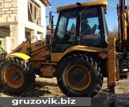 Экскаватор-погрузчик MST M544 2012 года б/у