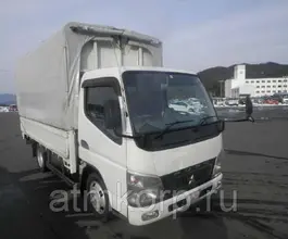 Тентованный грузовик Тентованный грузовик  Mitsubishi 2010 года б/у