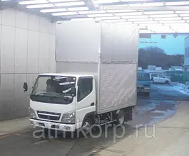 Тентованный грузовик Тентованный грузовик  Mitsubishi 2010 года б/у