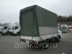 Тентованный грузовик Тентованный грузовик  Mitsubishi 2010 года б/у фото 2