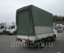 Тентованный грузовик Тентованный грузовик  Mitsubishi 2010 года б/у фото 2