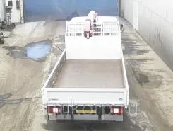 Самопогрузчик Mitsubishi Canter с КМУ Unic Ucan 264 2009 года б/у фото 3