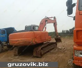 Фронтальный погрузчик Hitachi ZX200 2005 года б/у фото 4