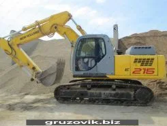 Экскаватор New Holland E215 2005 года б/у
