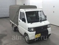 Тентованный грузовик Тентованный грузовик  Mitsubishi 2009 года б/у
