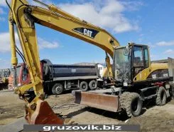 Экскаватор Caterpillar M318 2004 года б/у
