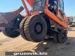 Экскаватор Doosan DX210W 2011 года б/у фото 4