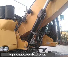 Экскаватор Caterpillar M322C MH 2003 года б/у фото 4