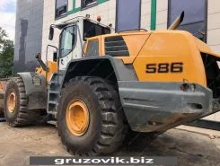 Фронтальный погрузчик Liebherr L 586 2plus2 2012 года б/у фото 4