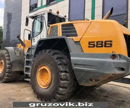 Фронтальный погрузчик Liebherr L 586 2plus2 2012 года б/у фото 4