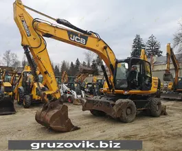 Экскаватор-погрузчик JCB JS 200W 2012 года б/у