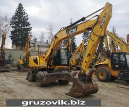 Экскаватор-погрузчик JCB JS 200W 2012 года б/у фото 2