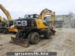 Экскаватор-погрузчик JCB JS 200W 2012 года б/у фото 3