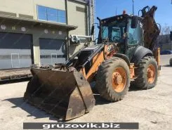 Экскаватор-погрузчик Case 695 ST 2013 года б/у