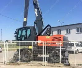 Экскаватор-погрузчик Atlas 250 MH 2015 года б/у