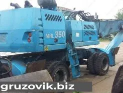 Экскаватор FUCHS MHL 350 2010 года б/у фото 3