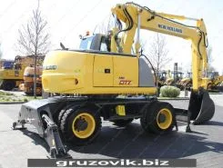 Экскаватор New Holland MH City 2009 года б/у