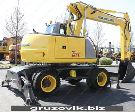 Экскаватор New Holland MH City 2009 года б/у