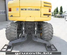 Экскаватор New Holland MH 3.6 2010 года б/у