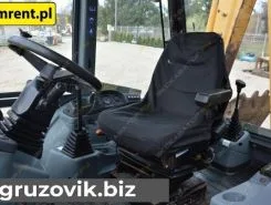 Экскаватор-погрузчик New Holland NH95-4PT 996 года б/у
