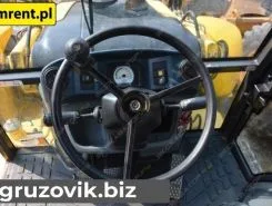 Экскаватор-погрузчик New Holland B115B 2012 года б/у фото 3