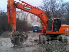 Экскаватор Doosan DX225LCA 2011 года б/у