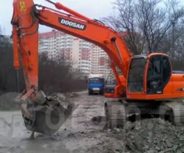 Экскаватор Doosan DX225LCA 2011 года б/у