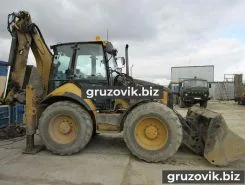 Экскаватор-погрузчик Caterpillar 444E 2006 года б/у