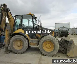 Экскаватор-погрузчик Caterpillar 444E 2006 года б/у