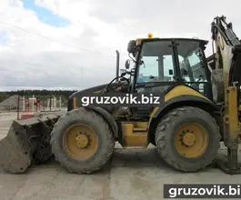 Экскаватор-погрузчик Caterpillar 444E 2006 года б/у фото 2