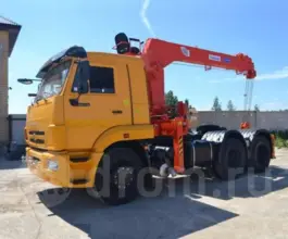 Тягач с КМУ Камаз 65117 2019 года б/у