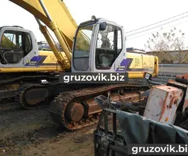 Экскаватор New Holland SK330 2006 года б/у
