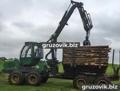 Лесовоз с КМУ Лесовоз  John Deere 1010E с КМУ  2009 года б/у