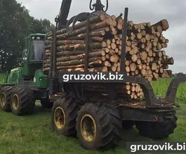 Лесовоз с КМУ Лесовоз  John Deere 1010E с КМУ  2009 года б/у фото 2