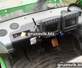 Лесовоз с КМУ Лесовоз  John Deere 1010E с КМУ  2009 года б/у фото 3