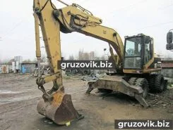 Экскаватор Caterpillar M312 1999 года б/у