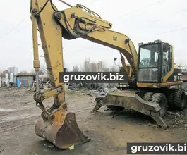 Экскаватор Caterpillar M312 1999 года б/у