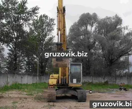 Экскаватор New Holland SK210-6E 2006 года б/у