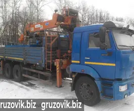 Самопогрузчик Камаз 65117 с КМУ Kanglim-1256 2012 года б/у