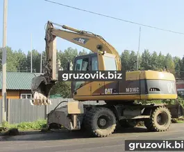 Экскаватор Caterpillar M316C 2004 года б/у