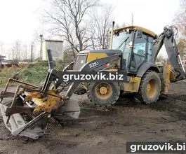 Экскаватор-погрузчик John Deere 325J 2011 года новый